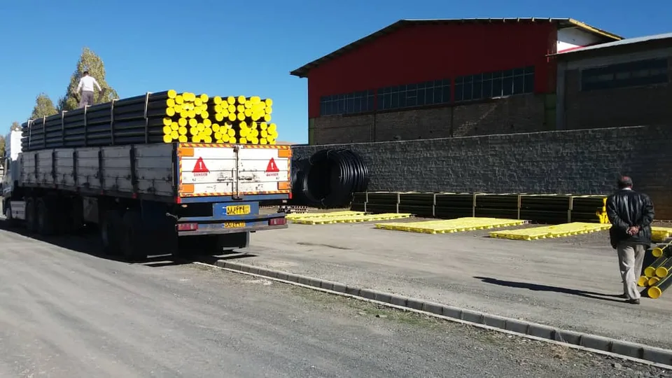 Coiled polyethylene pipes ready for storage at Bukan Pipe