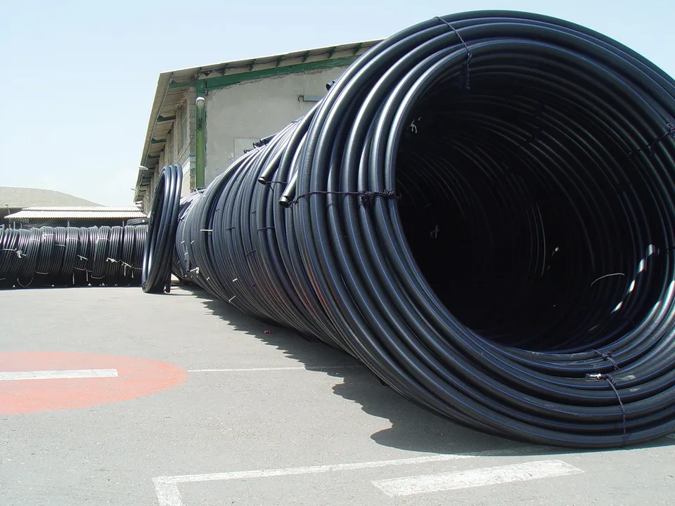 Polyethylene pipe products in the open yard at Bukan Pipe