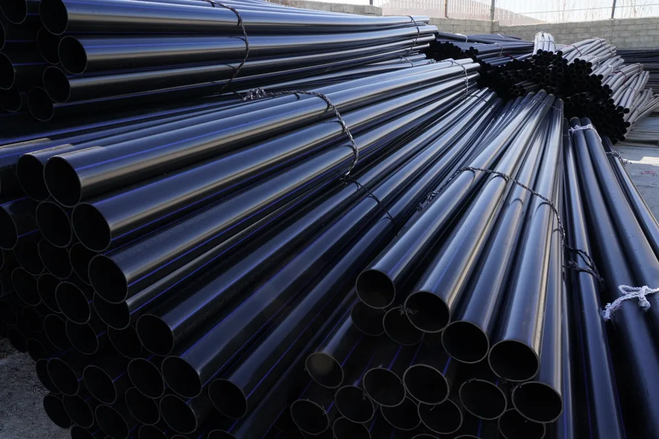 Coiled polyethylene pipes ready for storage at Bukan Pipe
