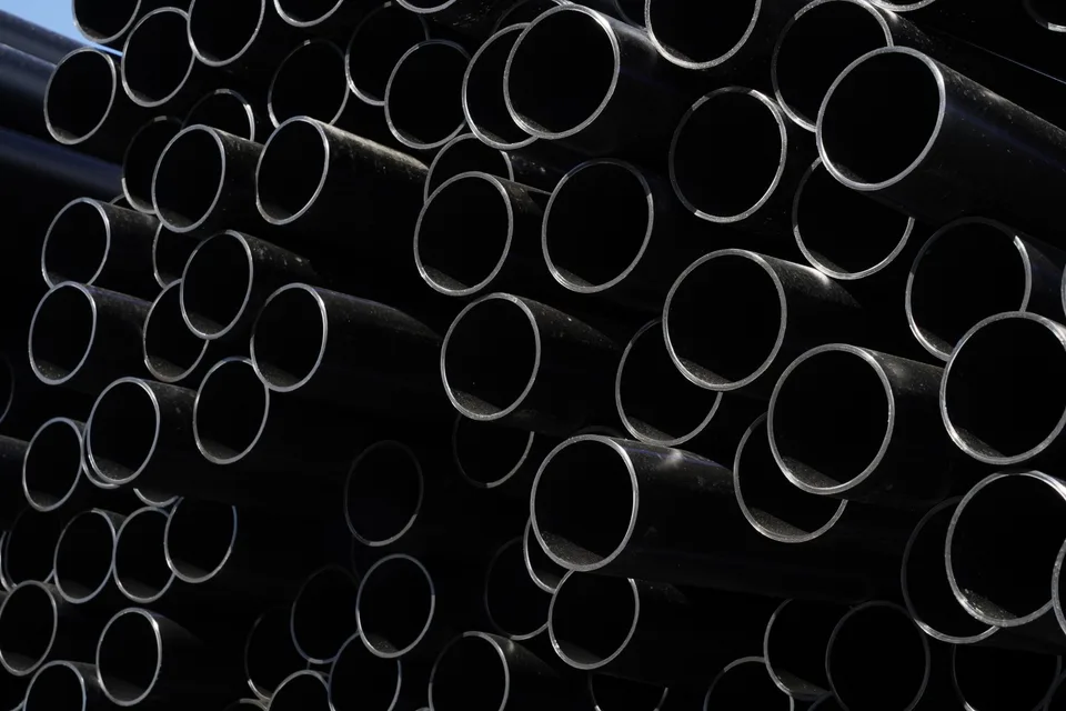 Polyethylene pipe products in the open yard at Bukan Pipe